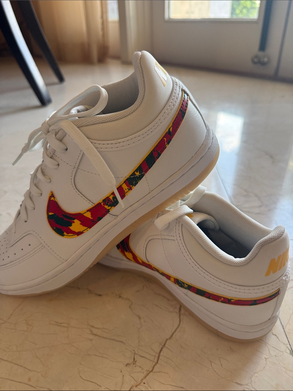 Nike White Low-Top Sky force Sneakers with Multicolor Swoosh and Heel Accent